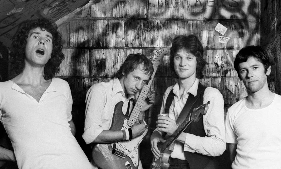 Dire Straits - Sultans Of Swing (Official Music Video) 