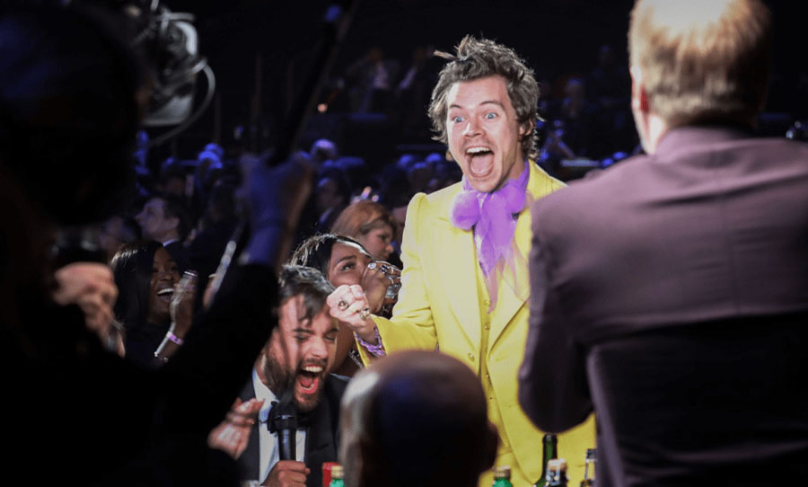Harry Styles cheering on his friend Lizzo (Image: Rex)