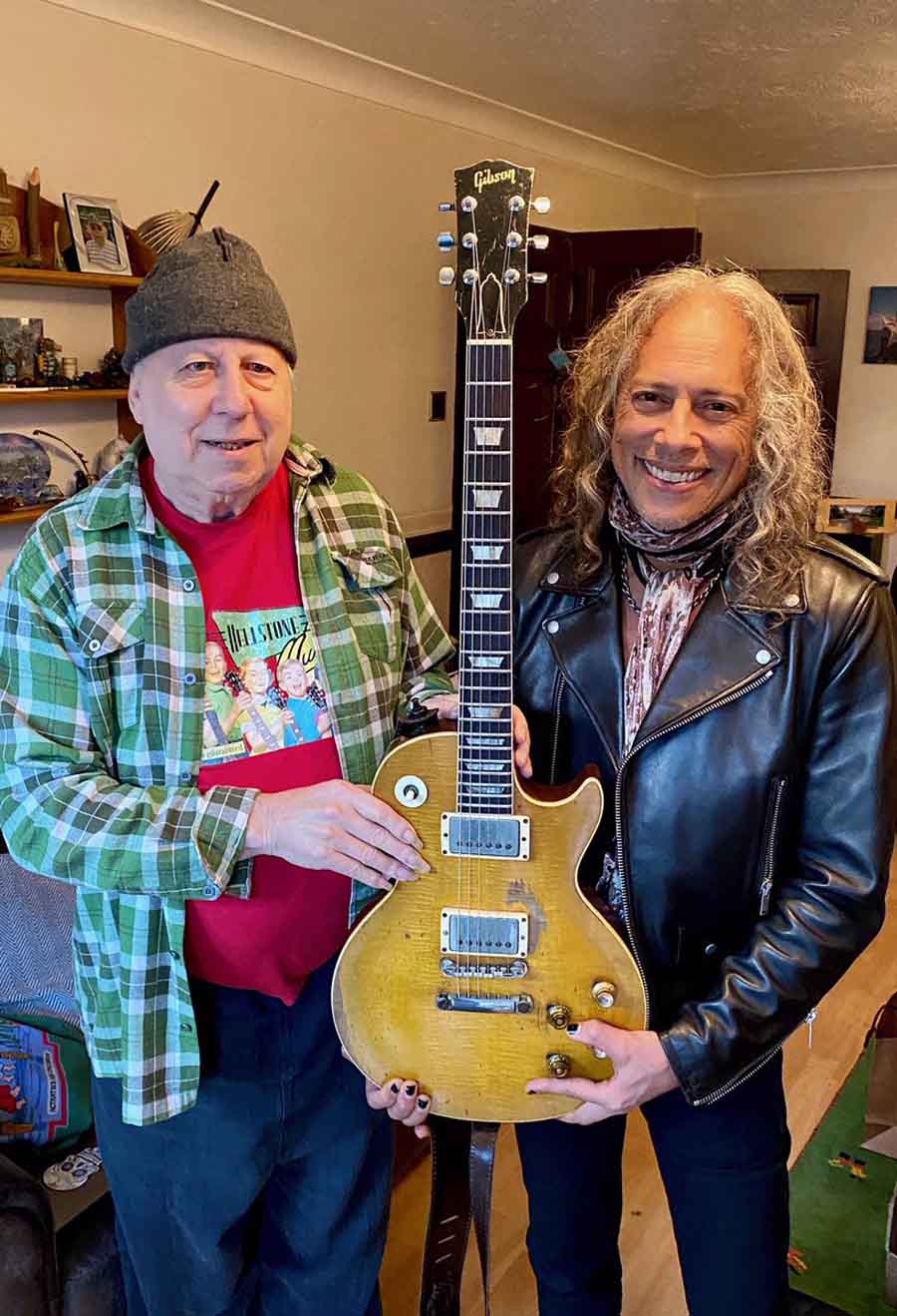 Hammett and Green with guitar