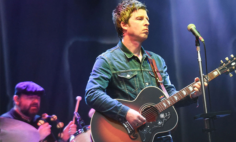 Noel Gallagher with his J-150
