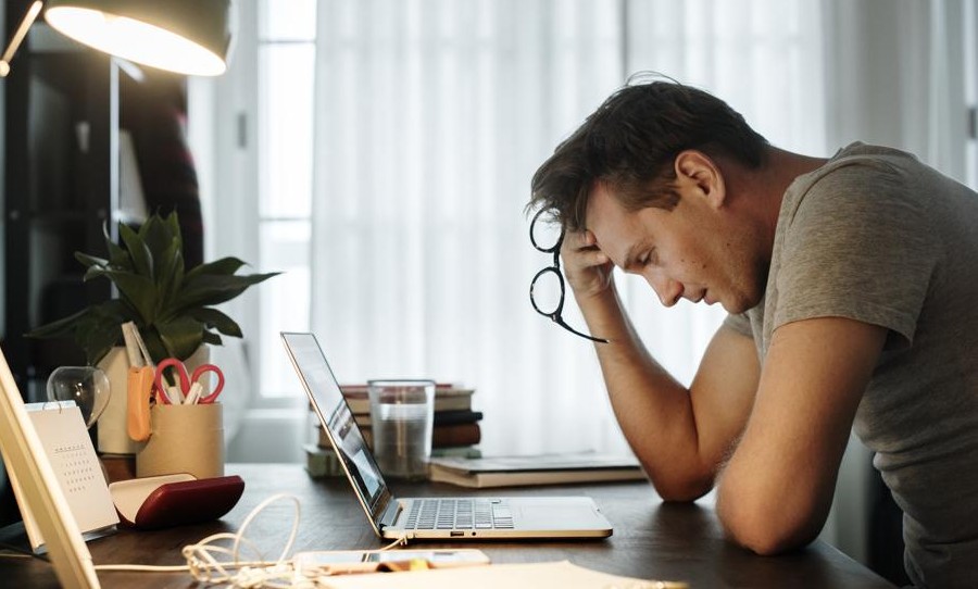 man upset at his computer