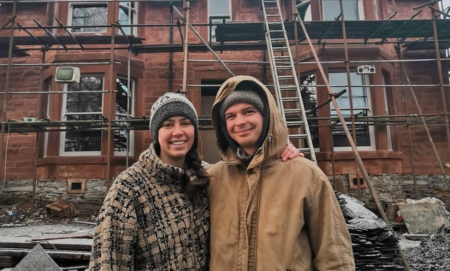 Cal and Claire outside the beginnings of their Dunoon mansion restoration