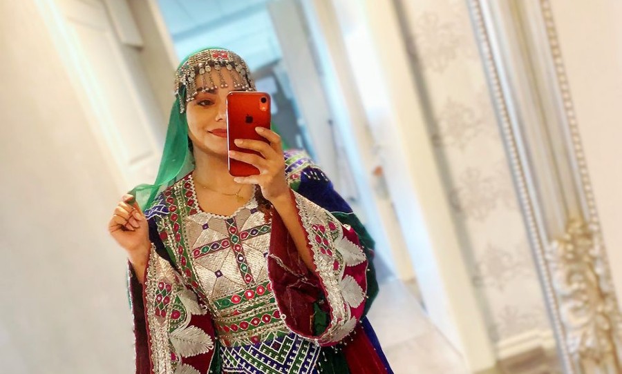 Photo of Wazhma Sayle in Stockholm, Sweden in traditional Afghan clothing. Photo obtained from social media via Reuters