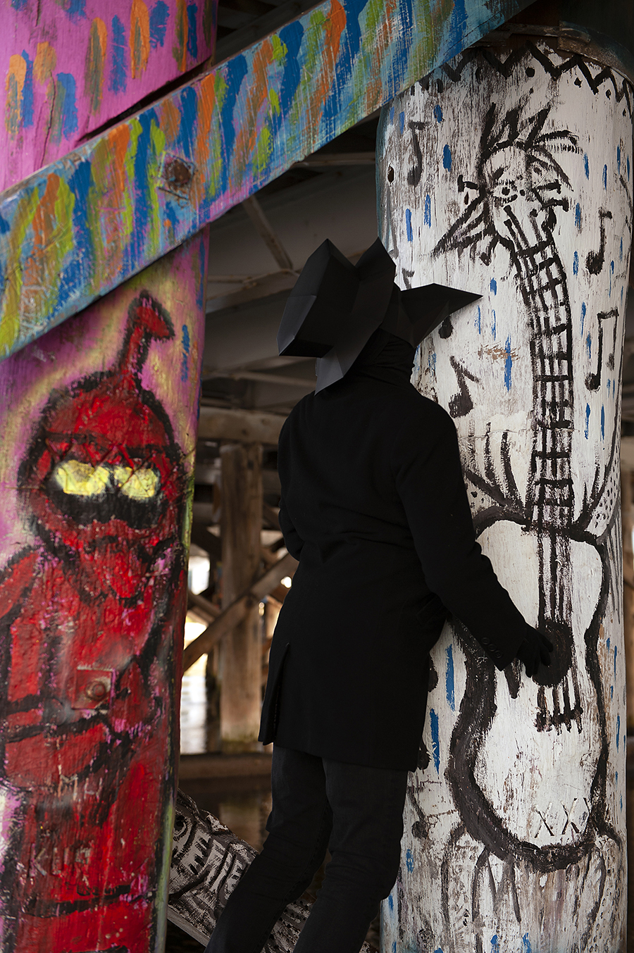 Plague Doctor photographed in gallery beneath Canning Bridge