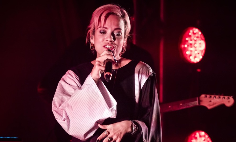Lily Allen performs on stage